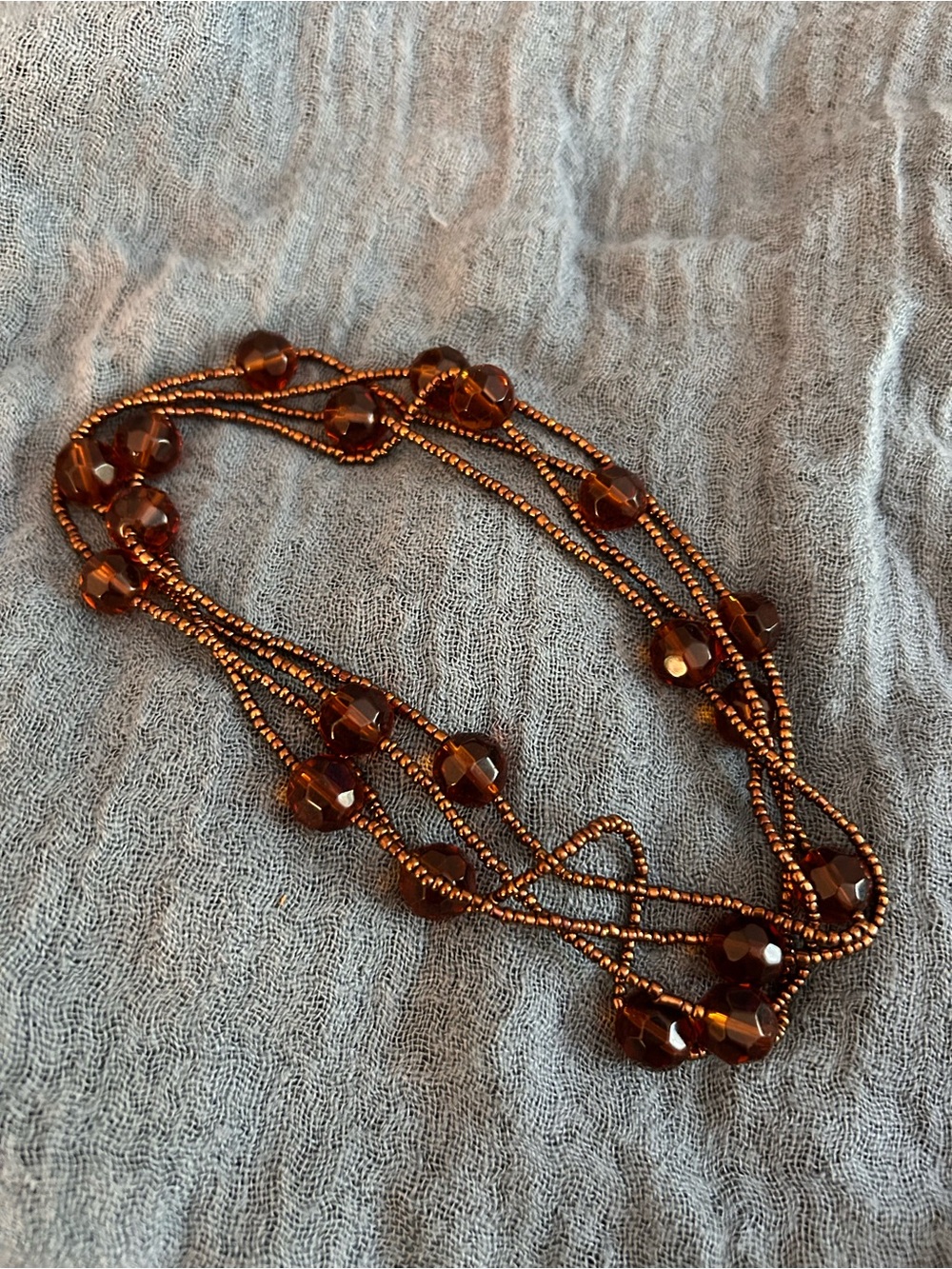 Single-Strand Hand Beaded Necklace - Bronze and Dark Amber tones.